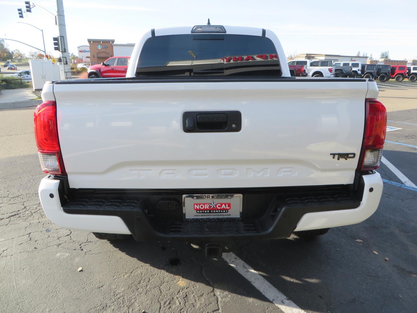 2019 White /black Toyota Tacoma TRD OFF-ROAD Double Cab (3TMAZ5CN4KM) with an 3.5L engine, automatic transmission, located at 2630 Grass Valley Highway, Auburn, CA, 95603, (530) 508-5100, 38.937893, -121.095482 - TRD Offroad 2WD sitting on Fox 2.5 remote reservoir DSC Coil-overs, Total Chaos upper control arms, Rigid Industries Dually side shooter leds, Fuel Rebel wheels, Nitto Ridge Grappler tires, and window tint. - Photo#5